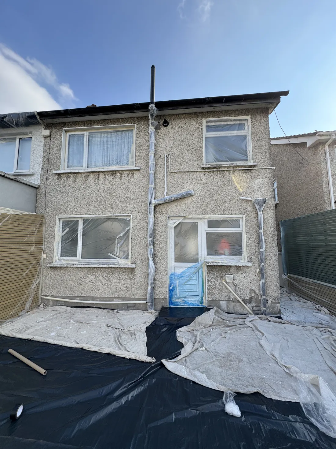 Exterior render and repaint protecting a Dublin house