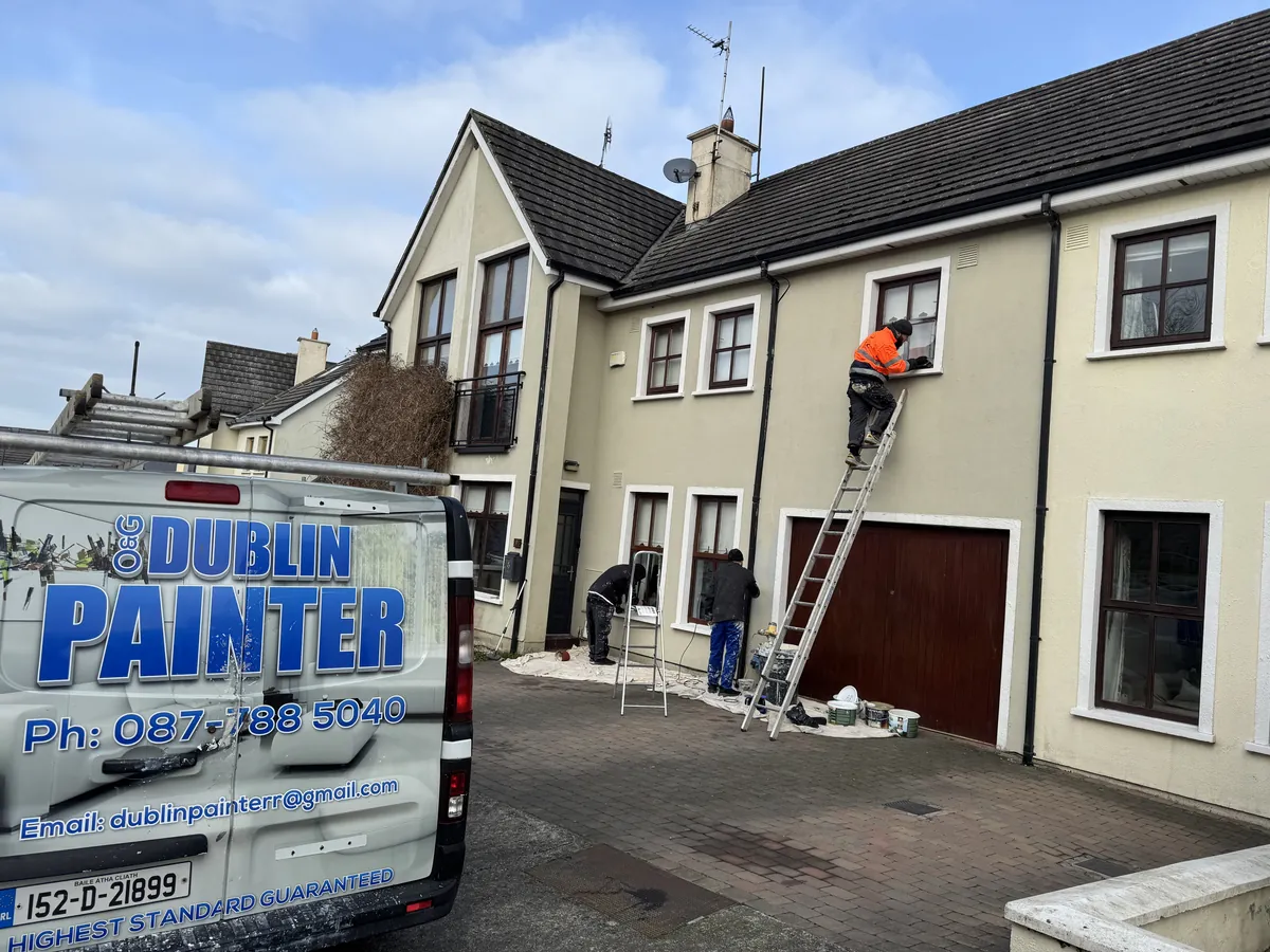 Original Dublin Painter crew painting a house exterior in Dublin, company van in view